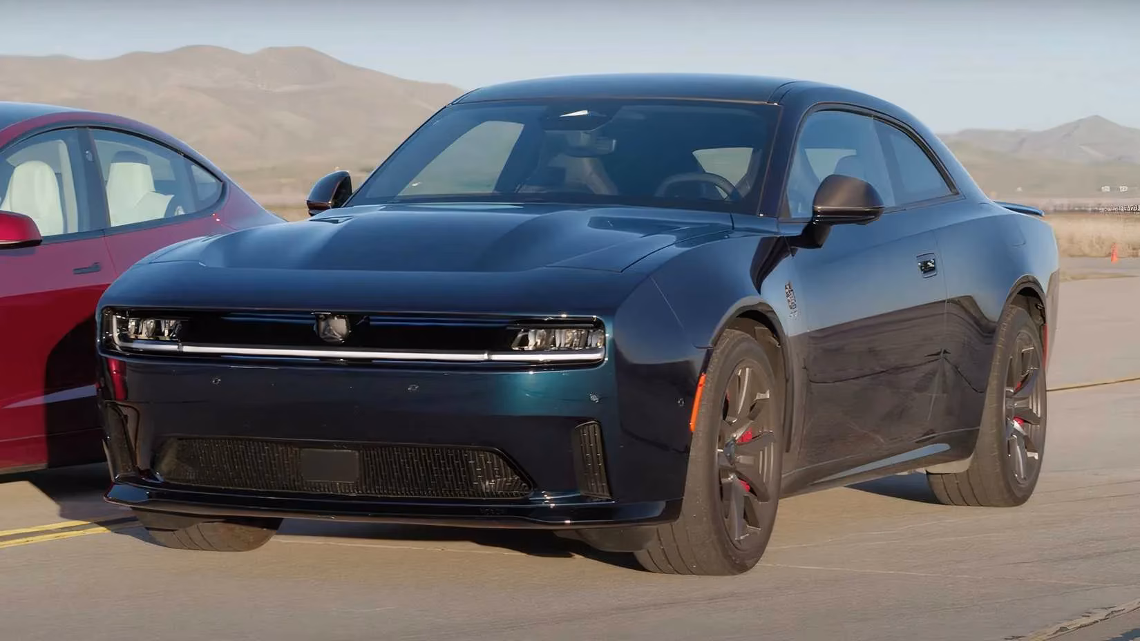 electric-muscle-clash-dodge-charger-ev-vs-tesla-model-3-performance-image-1